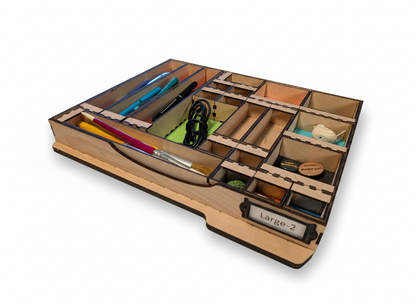 Wooden box with smaller wooden boxes inside it that are holding various items on a white background